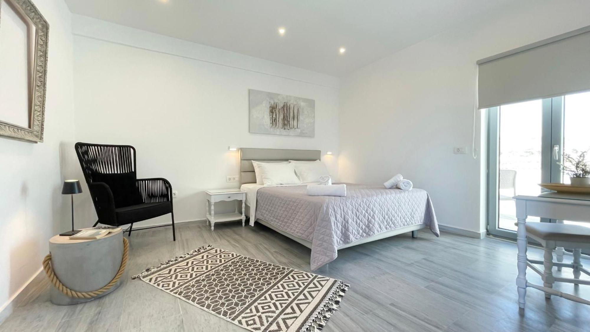 Hermoso Luxury Suites Monólithos Quarto foto
