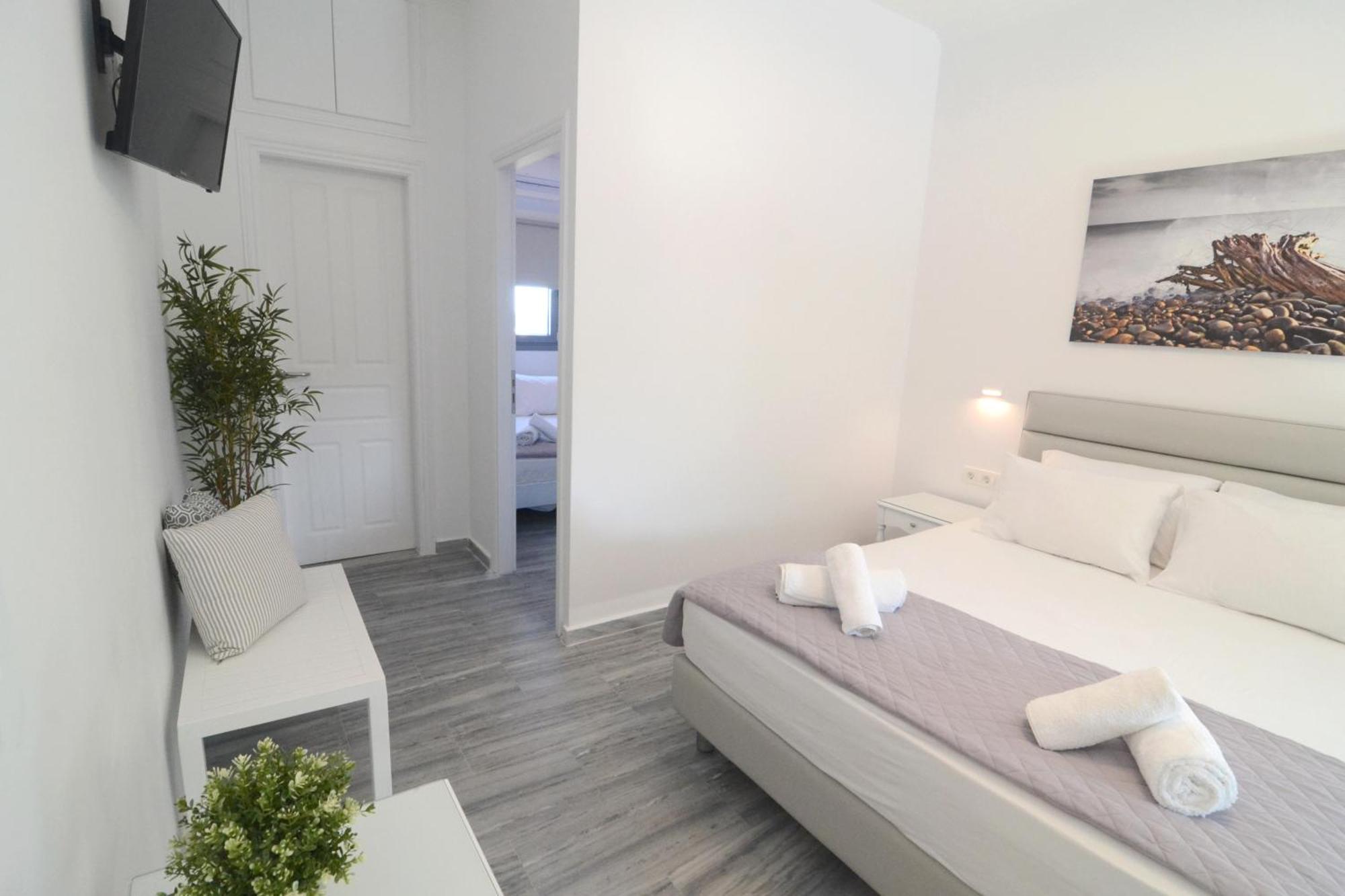 Hermoso Luxury Suites Monólithos Quarto foto
