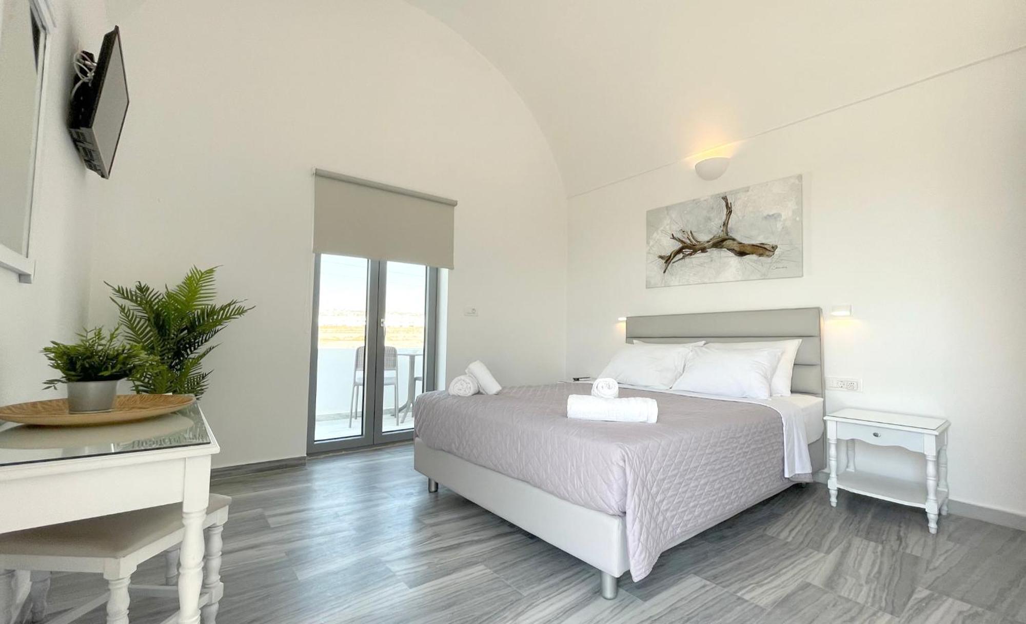 Hermoso Luxury Suites Monólithos Quarto foto